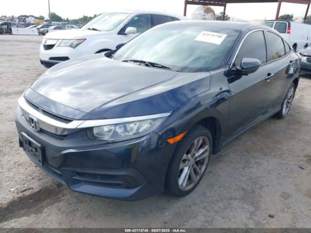2HGFC2F54JH584949 Honda Civic Lx