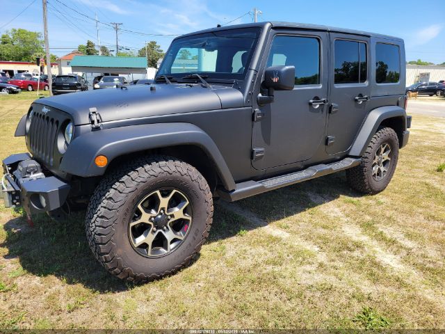1C4HJWDG4EL159619 Jeep Wrangler Unlimited Sport