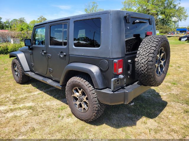 1C4HJWDG4EL159619 Jeep Wrangler Unlimited Sport