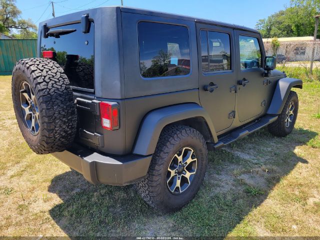 1C4HJWDG4EL159619 Jeep Wrangler Unlimited Sport