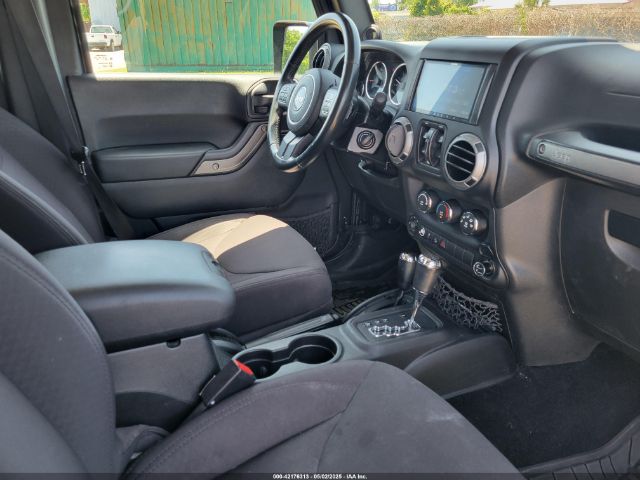 1C4HJWDG4EL159619 Jeep Wrangler Unlimited Sport