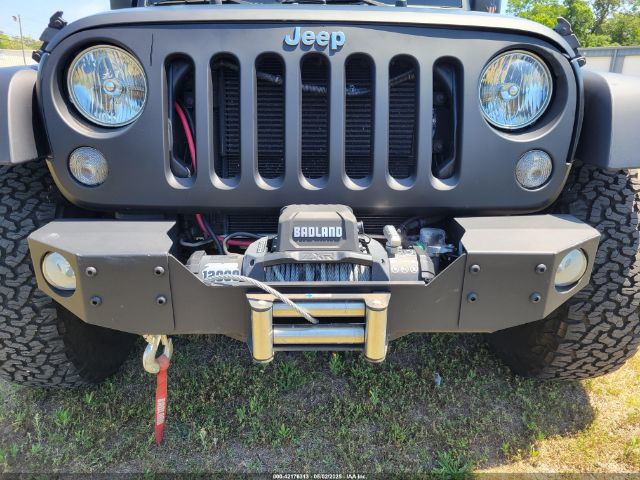 1C4HJWDG4EL159619 Jeep Wrangler Unlimited Sport