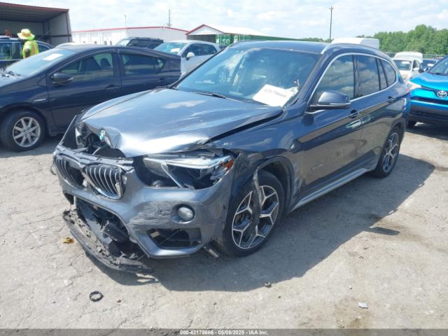 2016 BMW X1 WBXHT3C34G5E47922 Photo 1