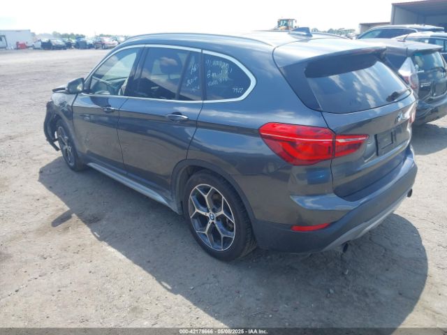 2016 BMW X1 WBXHT3C34G5E47922 Photo 2