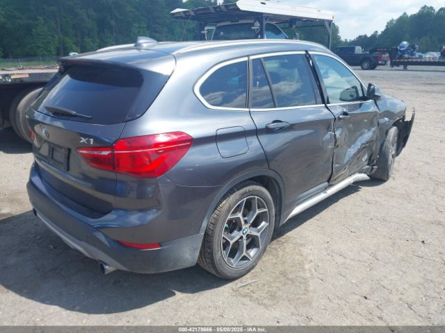 2016 BMW X1 WBXHT3C34G5E47922 Photo 3