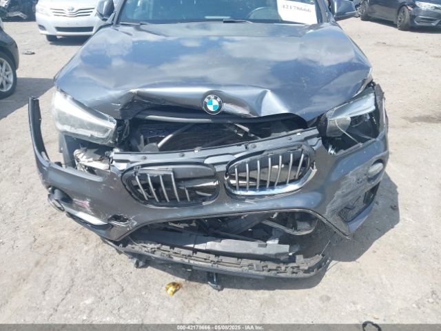 2016 BMW X1 WBXHT3C34G5E47922 Photo 5