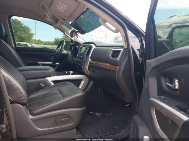 1N6AA1E64KN505272 Nissan Titan Sl