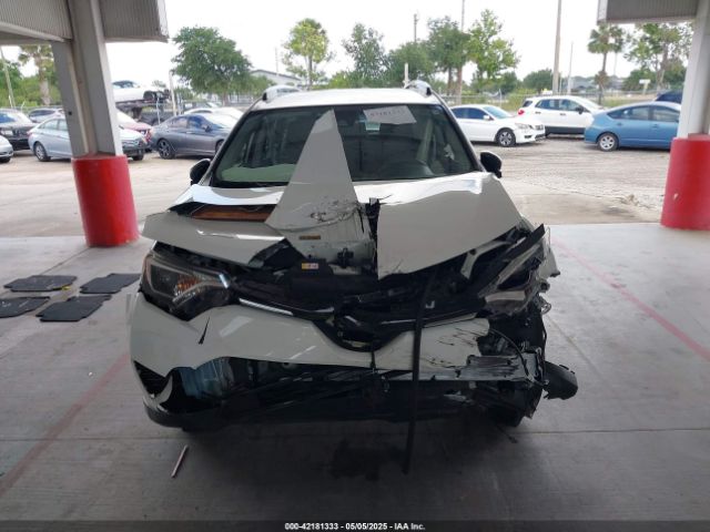 JTMZFREV3JJ187597 Toyota RAV4 LE
