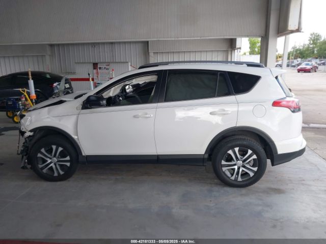JTMZFREV3JJ187597 Toyota RAV4 LE