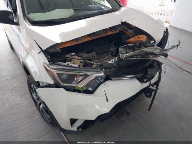 JTMZFREV3JJ187597 Toyota RAV4 LE