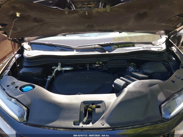 5FNYF8H03MB026880 Honda Passport Awd Elite