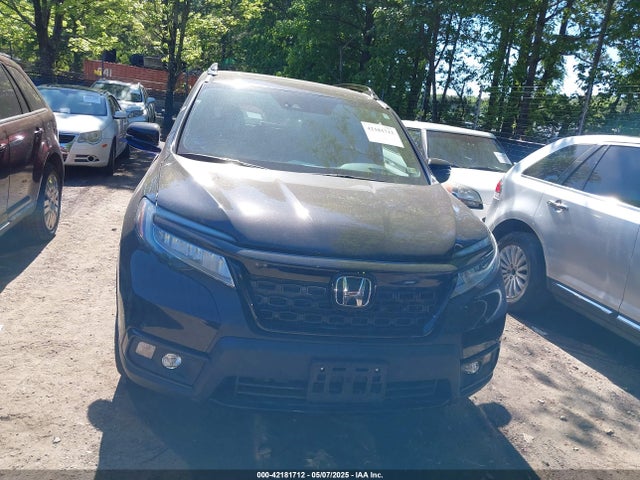 5FNYF8H03MB026880 Honda Passport Awd Elite