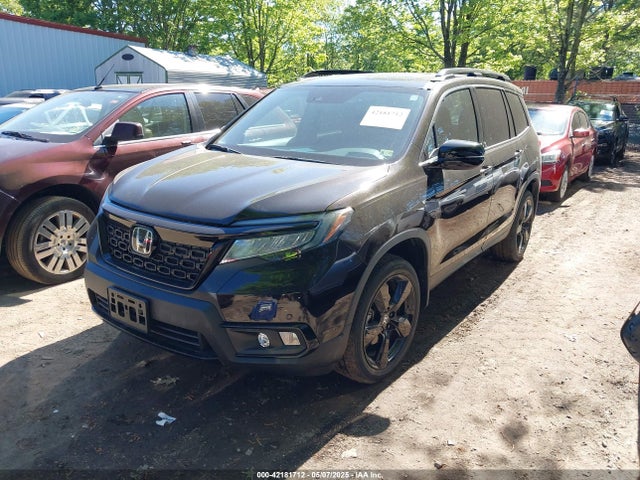 5FNYF8H03MB026880 Honda Passport Awd Elite