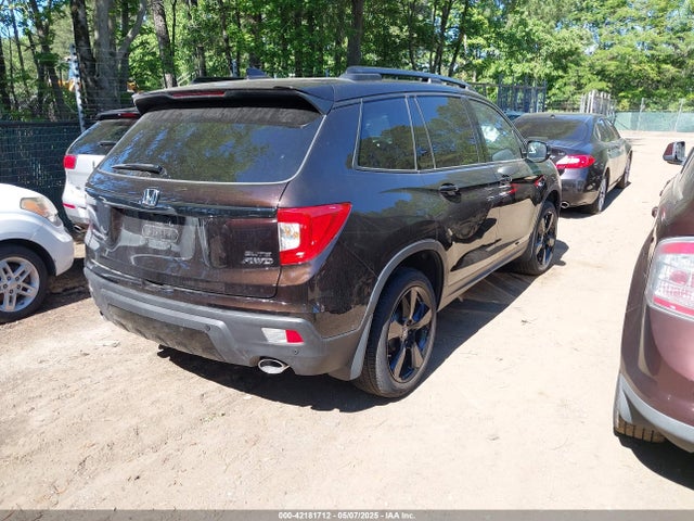 5FNYF8H03MB026880 Honda Passport Awd Elite