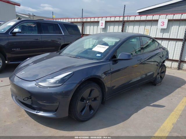2023 TESLA MODEL 3 5YJ3E1EA8PF404553 Photo 1