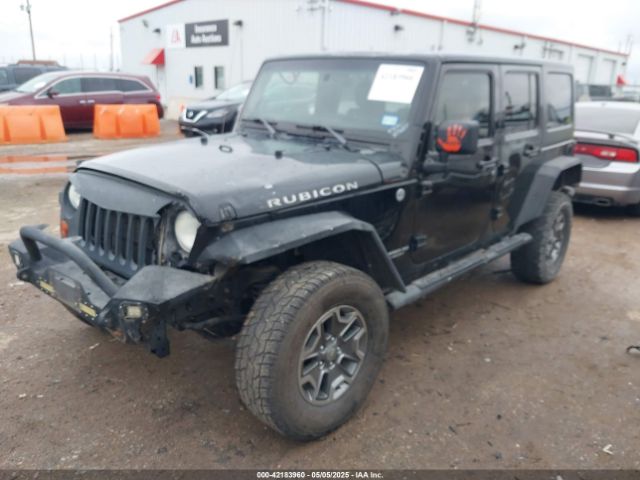2012 JEEP WRANGLER UNLIMITED 1C4HJWFGXCL142804 Photo 1