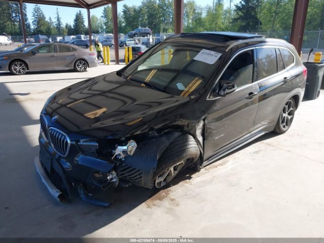 2018 BMW X1 WBXHT3C35J5L25056 Photo 1