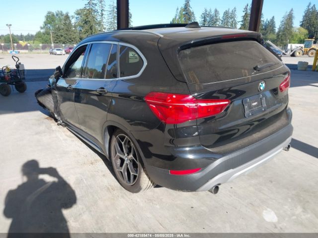 2018 BMW X1 WBXHT3C35J5L25056 Photo 2