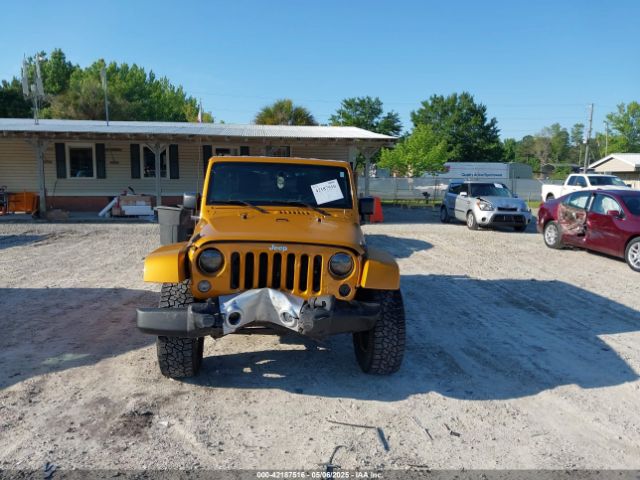 1C4BJWEG9EL195861 Jeep Wrangler Unlimited Sahara