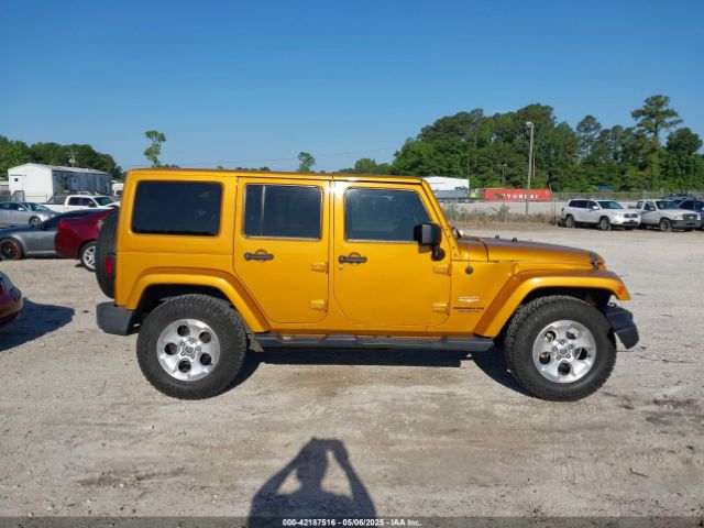 1C4BJWEG9EL195861 Jeep Wrangler Unlimited Sahara