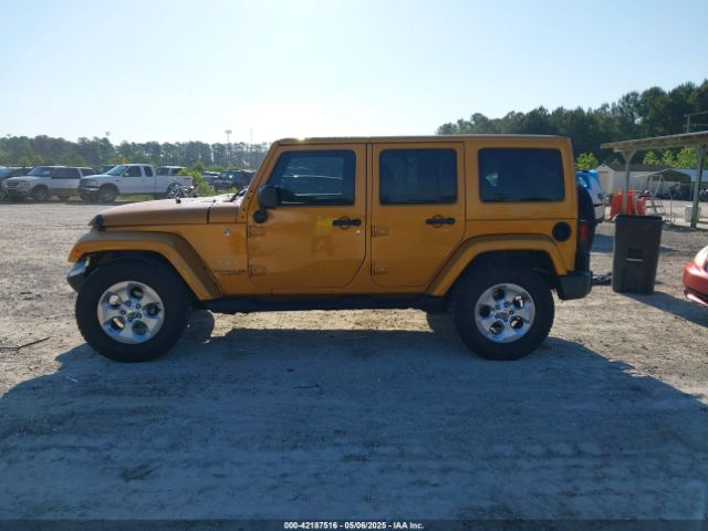 1C4BJWEG9EL195861 Jeep Wrangler Unlimited Sahara