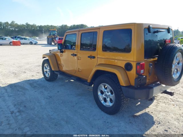 1C4BJWEG9EL195861 Jeep Wrangler Unlimited Sahara