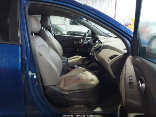 KM8JU3AG7EU822148 Hyundai TUCSON SE