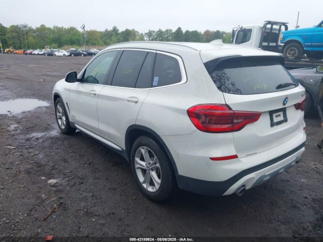 2018 BMW X3 5UXTR9C5XJLC72796 Photo 2