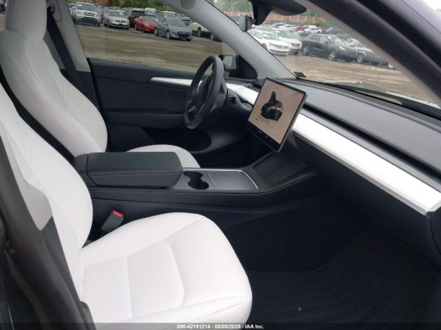 2023 TESLA MODEL Y 7SAYGDEF1PF838247 Photo 4
