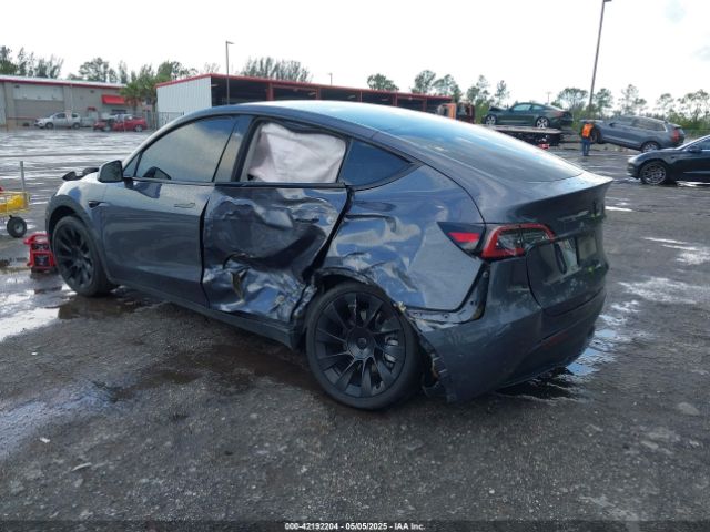 2023 TESLA MODEL Y 7SAYGDED0PF947510 Photo 2
