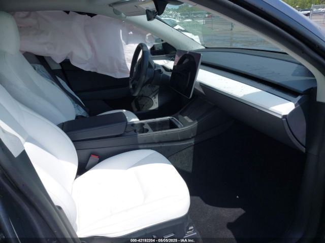 2023 TESLA MODEL Y 7SAYGDED0PF947510 Photo 4