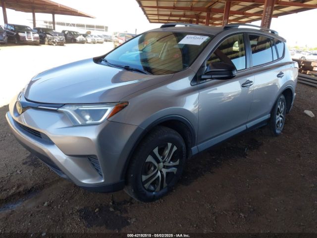 JTMZFREV6JJ191286 Toyota RAV4 LE