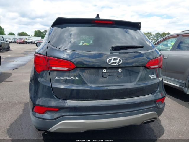 5NMZUDLBXJH058912 Hyundai Santa Fe Sport 2.4l