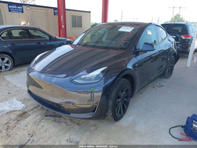 2024 TESLA MODEL Y 7SAYGDEE7RA229591 Photo 1