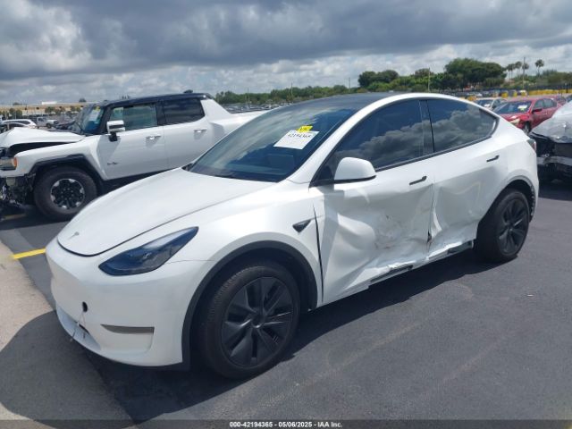 2025 TESLA MODEL Y 7SAYGDED0SA357958 Photo 1