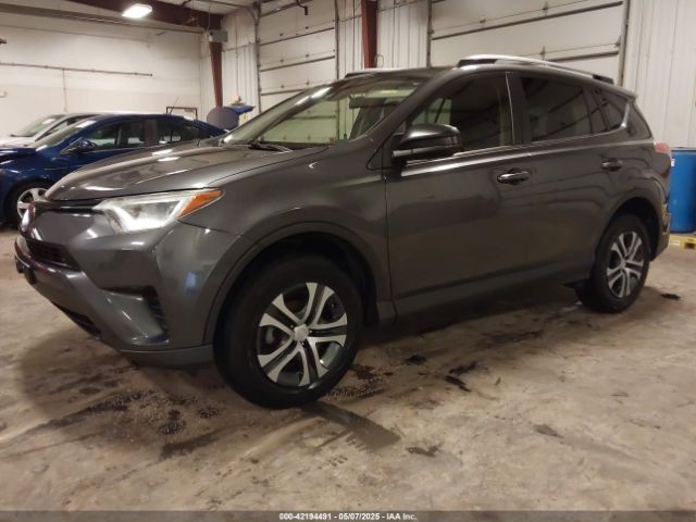 JTMBFREV2JJ246396 Toyota RAV4 LE