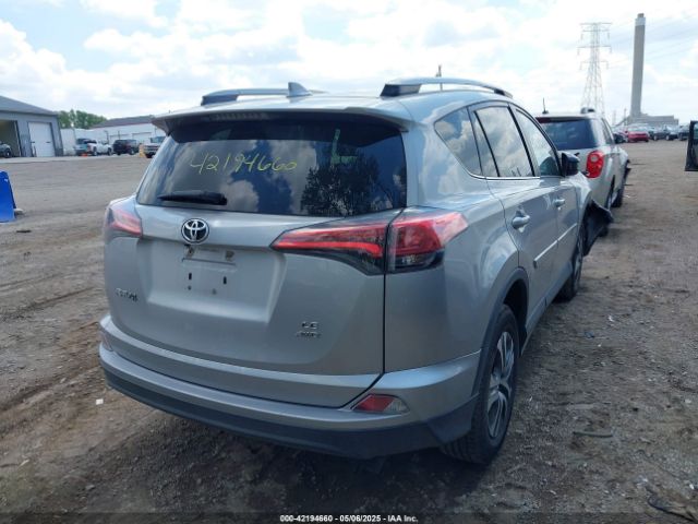 2T3BFREV3JW719918 Toyota RAV4 LE