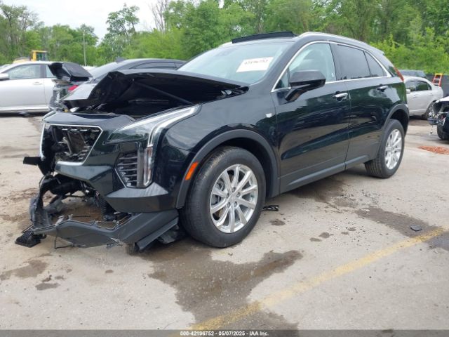 2021 CADILLAC XT4 1GYAZAR44MF004295 Photo 1