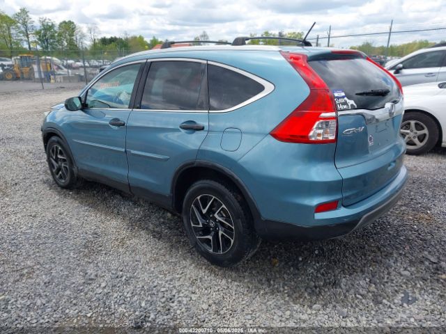 2HKRM4H48GH609389 Honda CR-V SE