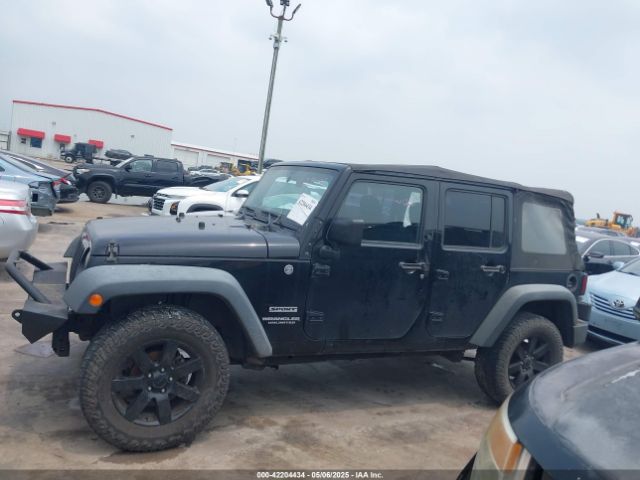 1C4BJWDG0EL290441 Jeep Wrangler Unlimited Sport