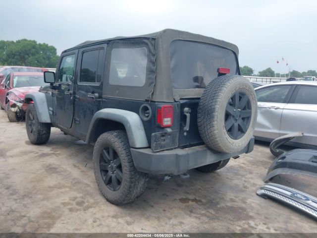 1C4BJWDG0EL290441 Jeep Wrangler Unlimited Sport