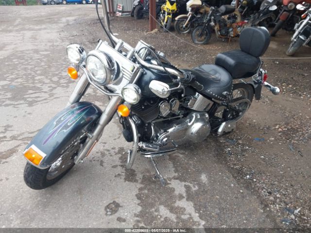 2015 HARLEY-DAVIDSON FLSTC 1HD1BWV11FB018571 Photo 1