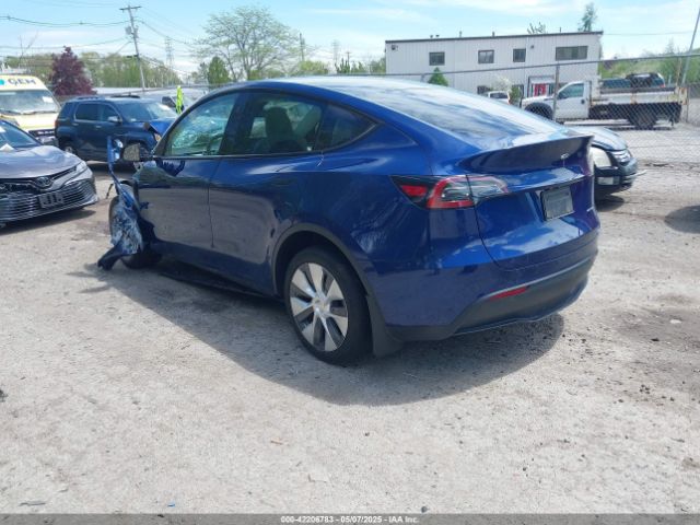 2024 TESLA MODEL Y 7SAYGDEE9RA219631 Photo 2