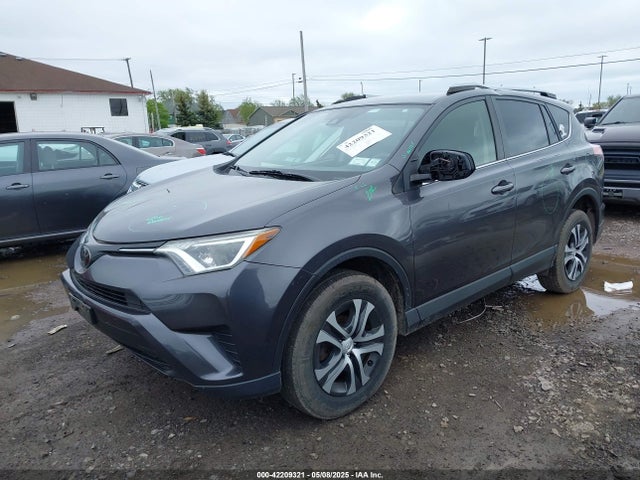 JTMBFREV6JJ216284 Toyota RAV4 LE