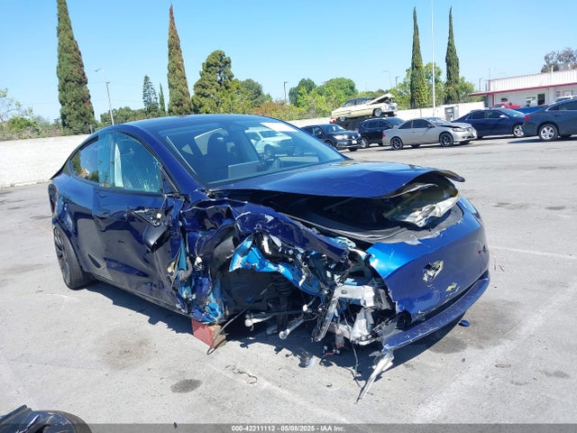 2023 TESLA MODEL Y 7SAYGDEF4PF709015 Photo 0