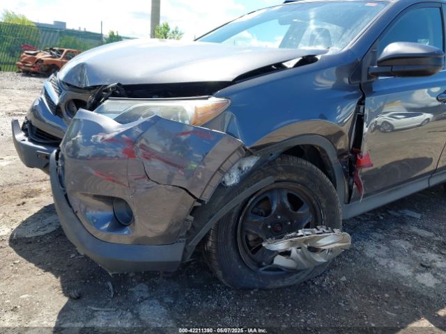 JTMBFREV0EJ007998 Toyota RAV4 LE