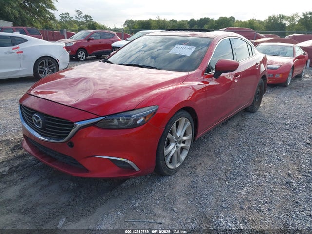 JM1GJ1T58G1436933 Mazda py