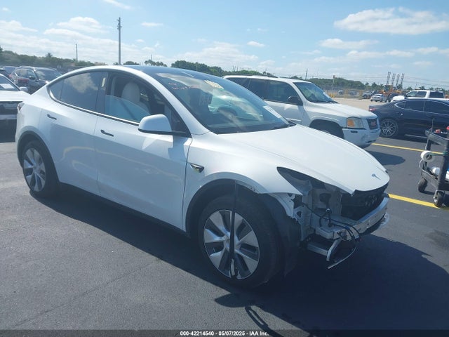 2023 TESLA MODEL Y 7SAYGDED7PF945916 Photo 0