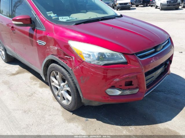 1FMCU0JX1EUE11061 Ford Escape Titanium