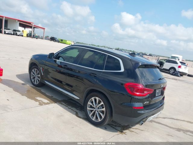 2019 BMW X3 5UXTR7C58KLR49721 Photo 2
